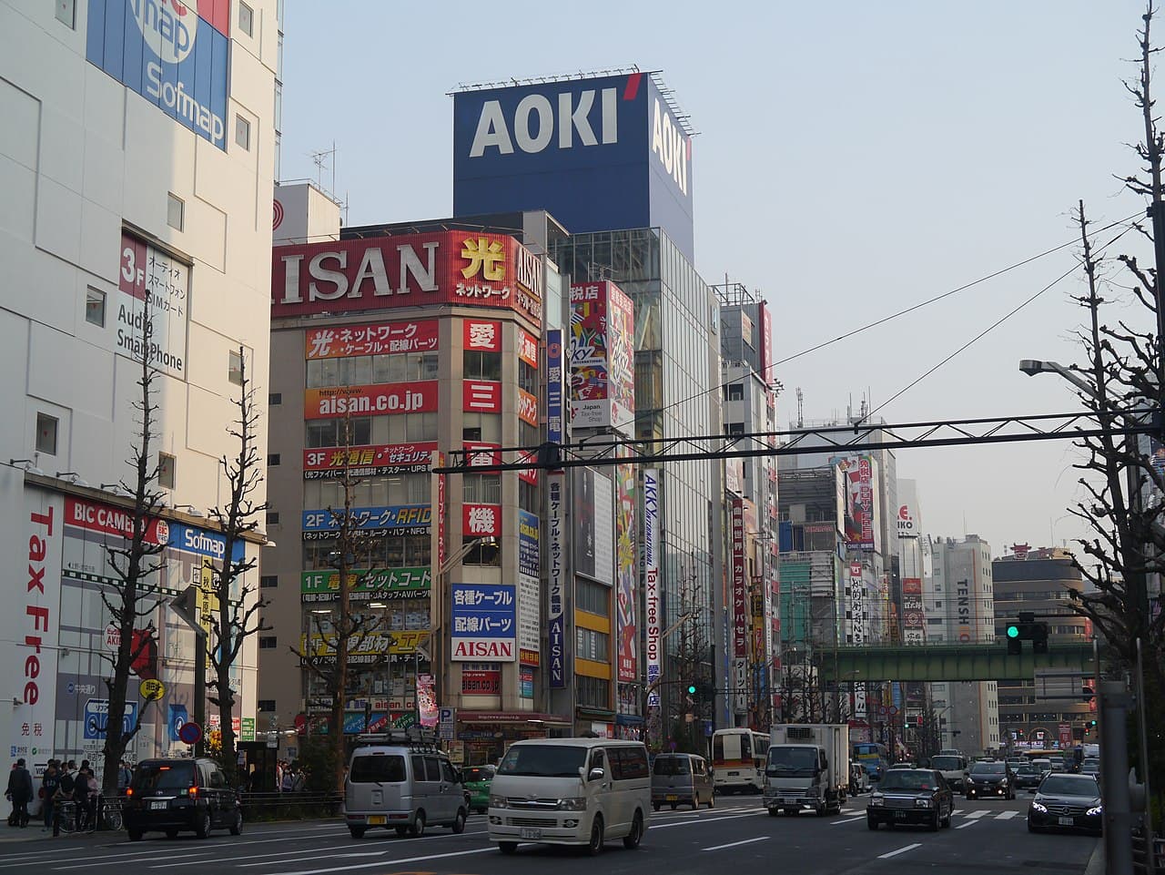 Wide daytime view of Akihabara Electric Town's main street in Tokyo, the starting point of a 3-day otaku itinerary.