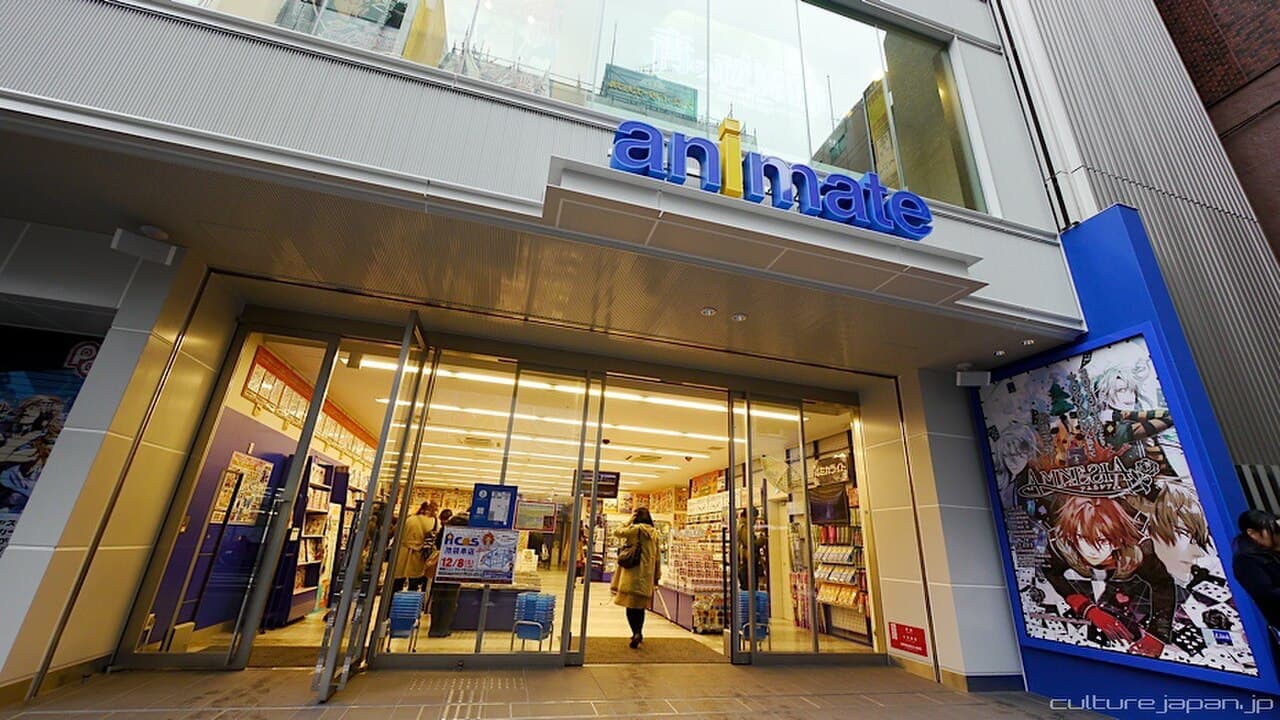 The storefront entrance of animate's flagship Ikebukuro store, photographed in December 2012 shortly after it relocated to this 1-20-7 Higashi-Ikebukuro address — before the March 2023 renovation.