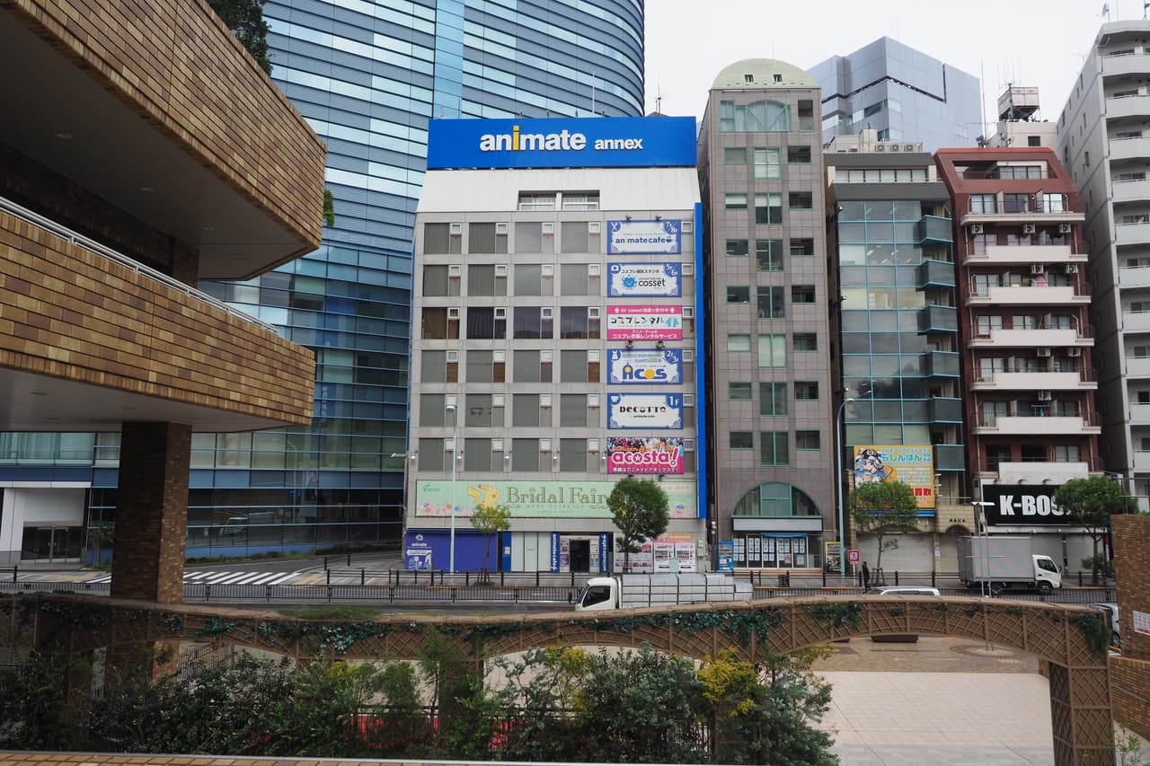 Street-level view of Animate Annex and the Lashinbang Ikebukuro Main Store storefronts in Ikebukuro, Tokyo