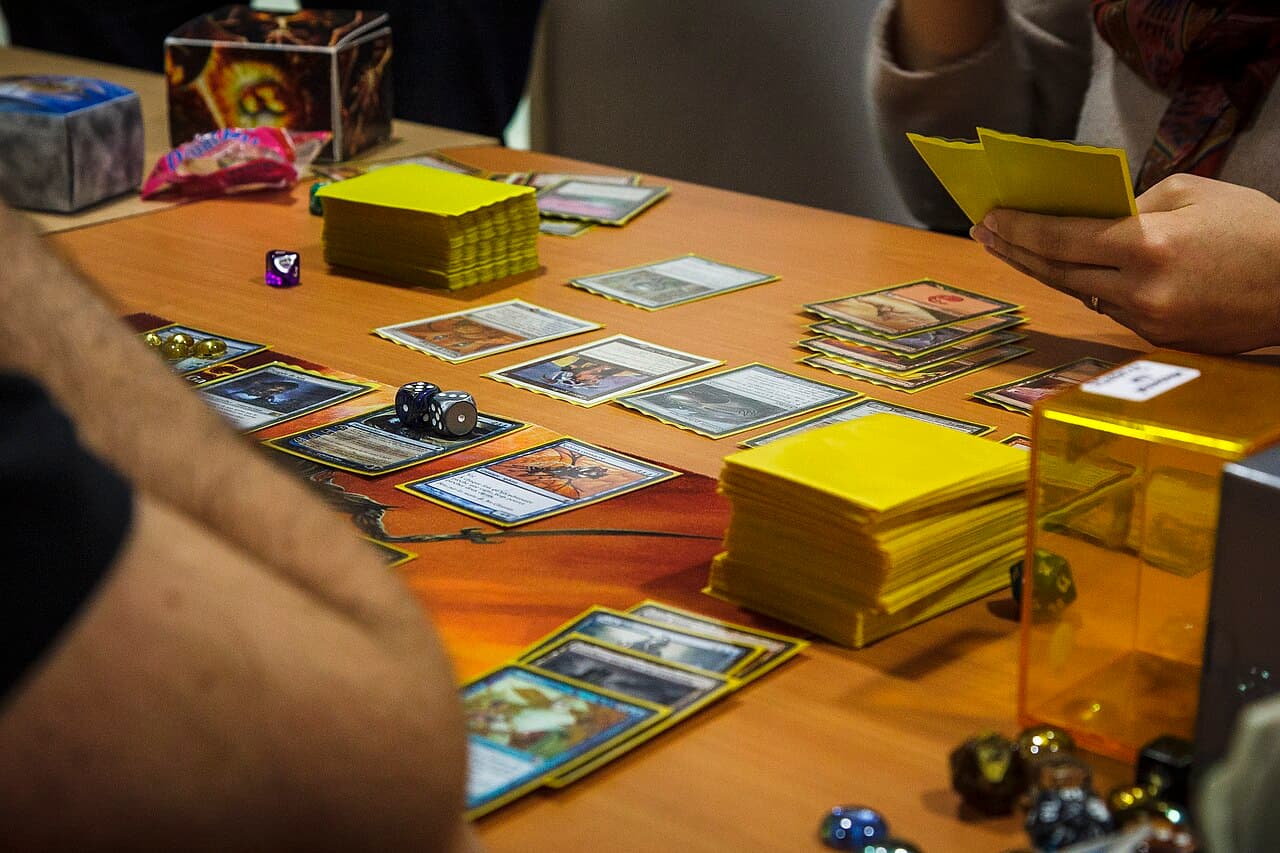 A Magic: The Gathering Commander game in progress on a play table — the kind of casual play you can join at Tokyo's card shops.